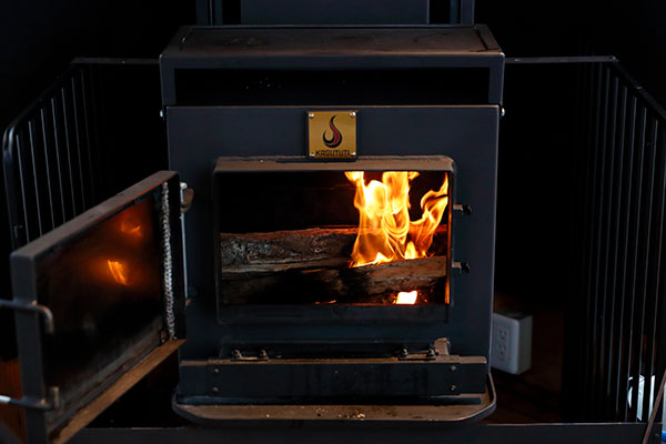 Install a wood stove in fall and winter