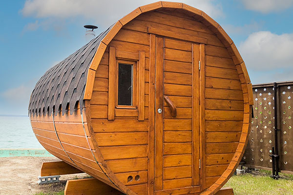 Marine dome with barrel sauna