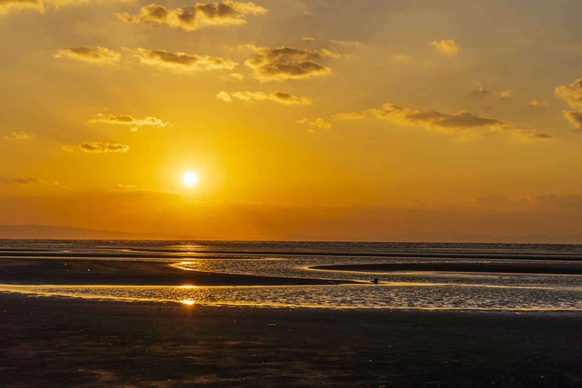 Private beach at sunset